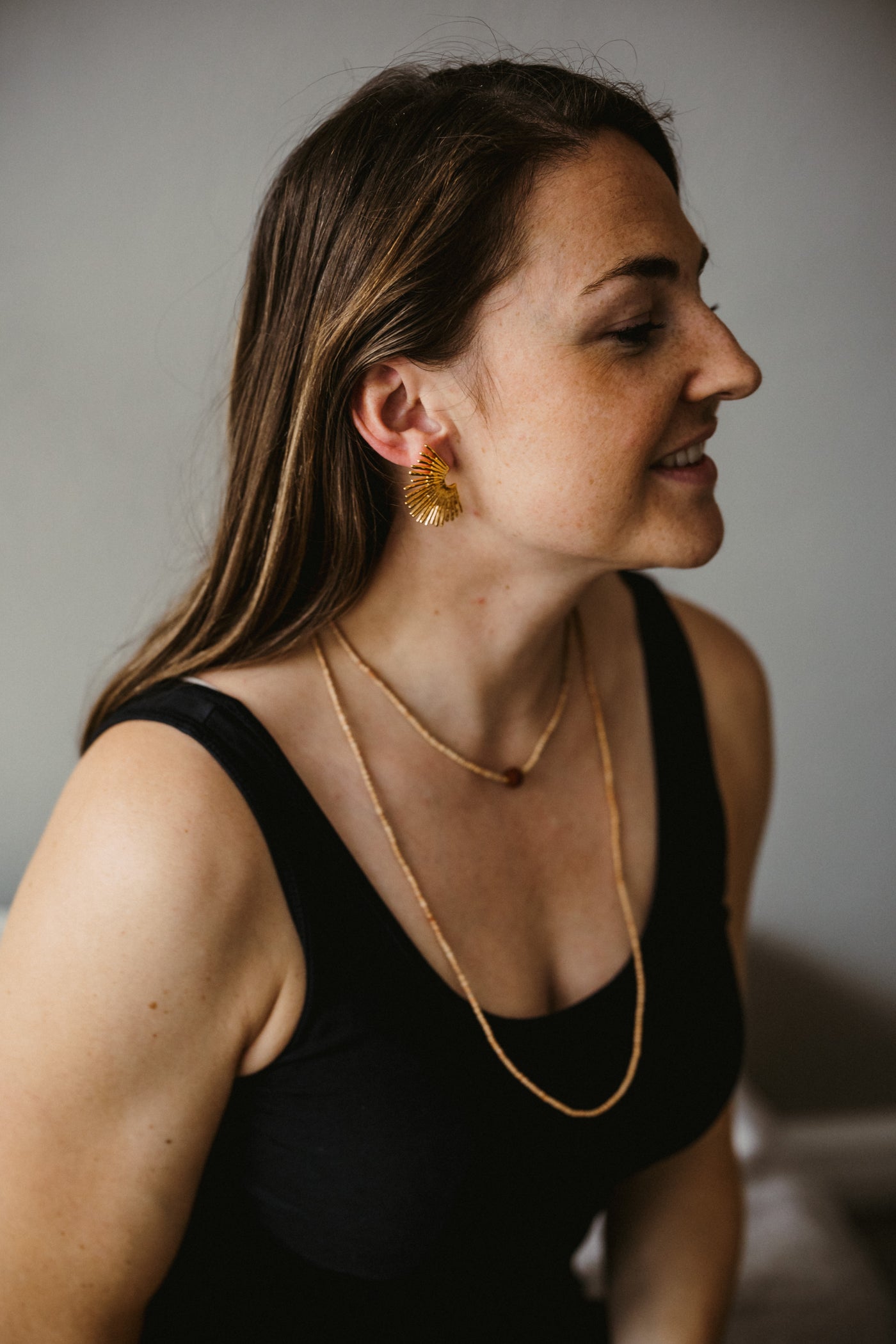 Ohrring in einer Sonnenform