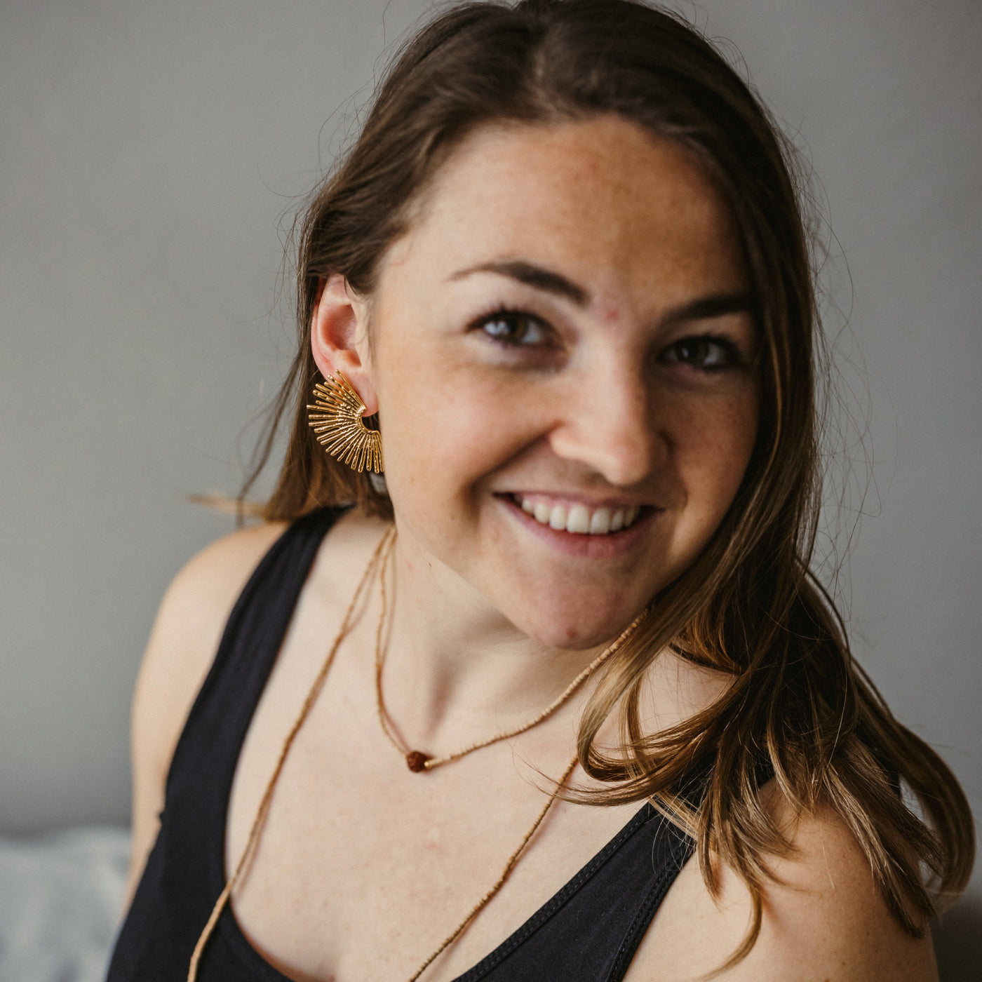 Ohrring in einer Sonnenform