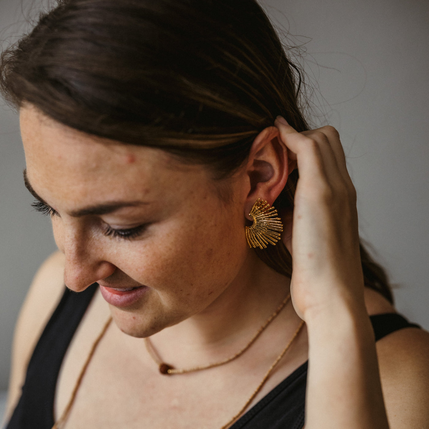 Ohrring in einer Sonnenform