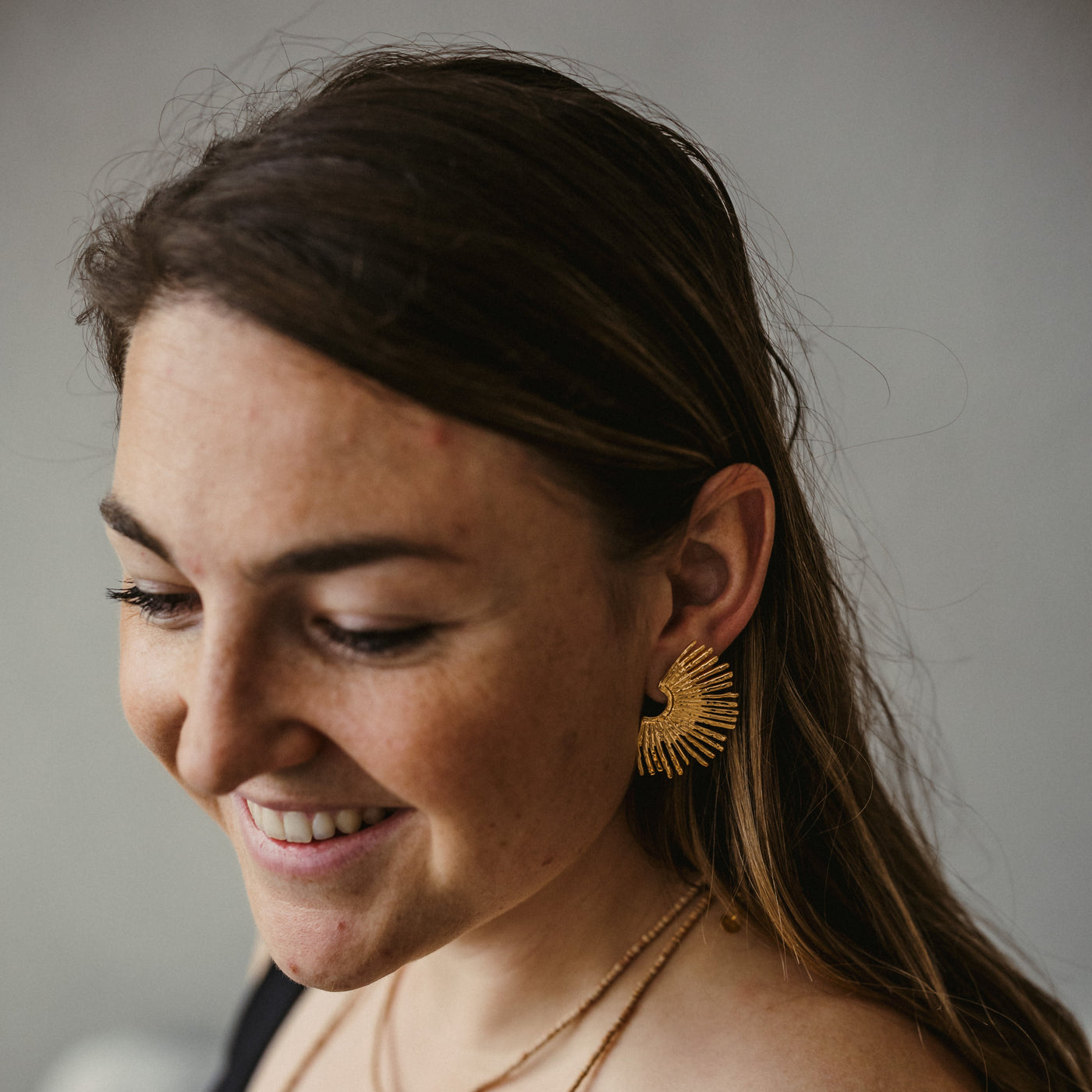 Ohrring in einer Sonnenform